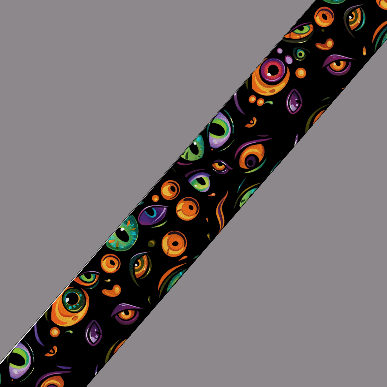 L'atelier du Fourmilier BioThane imprimé au mètre Motif BioThane imprimé UV – Yeux multicolores sur fond noir