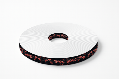 L'atelier du Fourmilier BioThane imprimé au mètre BioThane® imprimé – Fleurs de cerisier rouges sur fond noir