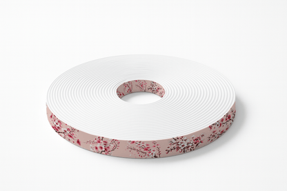 L'atelier du Fourmilier BioThane imprimé au mètre BioThane® imprimé – Fleurs de cerisier sur fond rose poudré