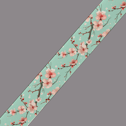 L'atelier du Fourmilier BioThane imprimé au mètre BioThane® imprimé – Fleurs de cerisier sur fond vert d'eau