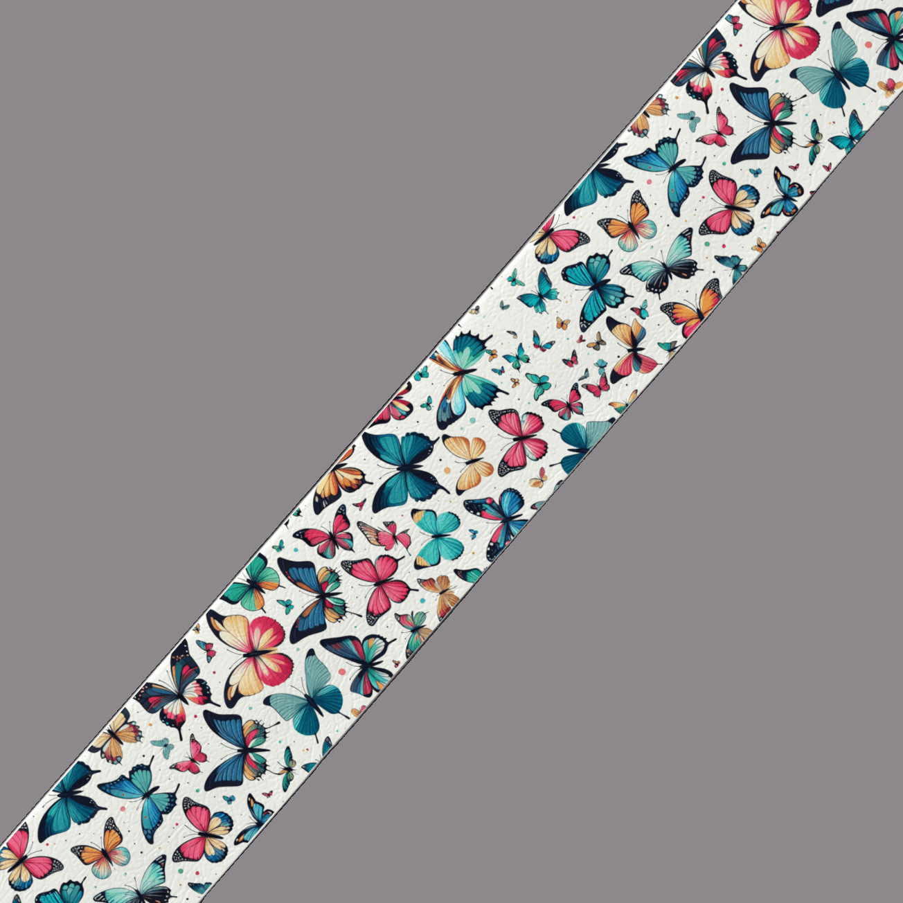 L'atelier du Fourmilier BioThane imprimé au mètre BioThane imprimé – Motif Papillons multicolores (au mètre)