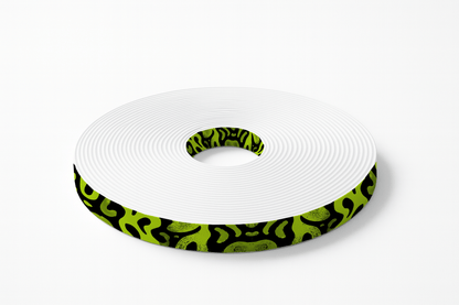 L'atelier du Fourmilier BioThane imprimé au mètre BioThane® imprimé – Taches abstraites vert fluo sur noir